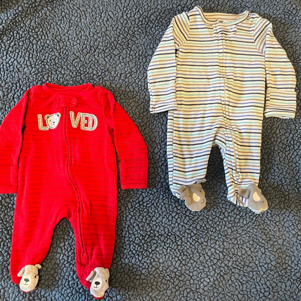 Carters 2 pack newborn zip sleepers. Gently used, no stains.